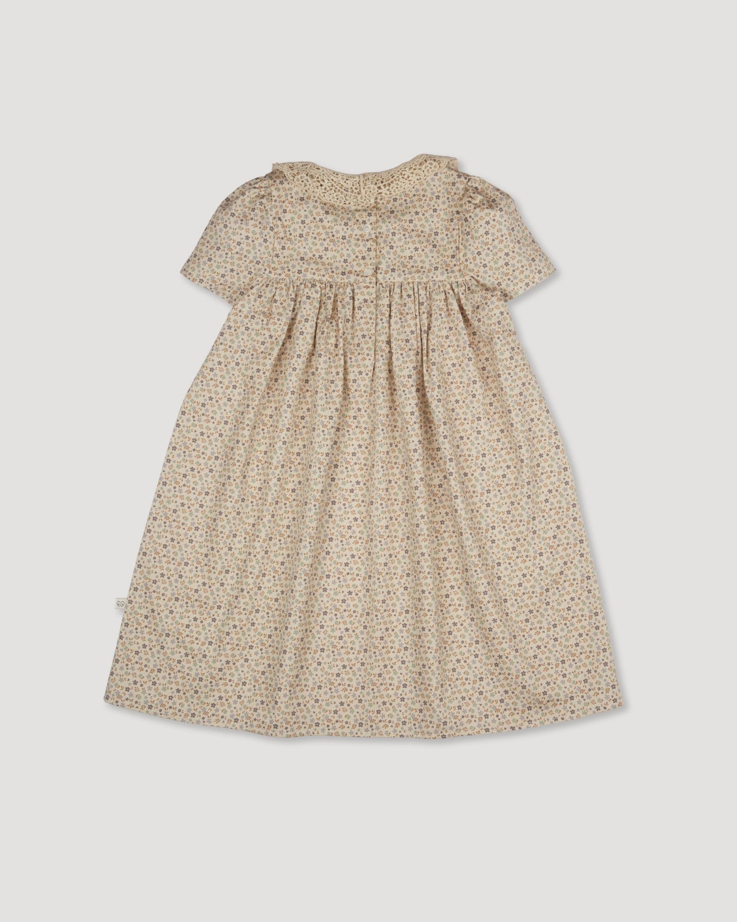 Early Sunday, Erika Dress in Miny Flowers print, made from Printed Cotton Satin fabric, featuring Flowy A-line silhouette allows ease of movement and day-long comfort, shown in a back flat-lay view