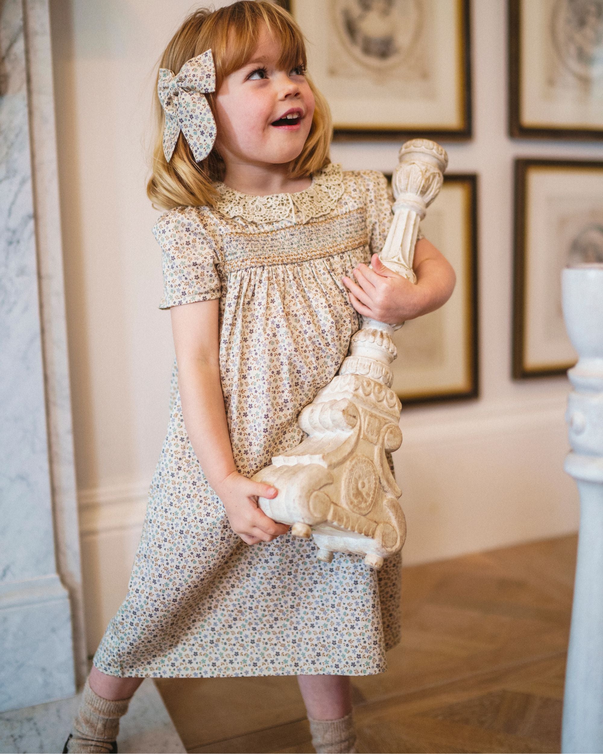 Early Sunday, Erika Dress in Miny Flowers print, made from Printed Cotton Satin fabric, featuring Flowy A-line silhouette allows ease of movement and day-long comfort, shown in a front view of model wearing it