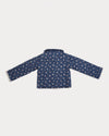Early Sunday, Esmée Jacket in Ditsy Bouquet Navy, made from Printed Cotton Satin fabric, featuring a quilted layer with floral detailing, shown in a back flat-lay view