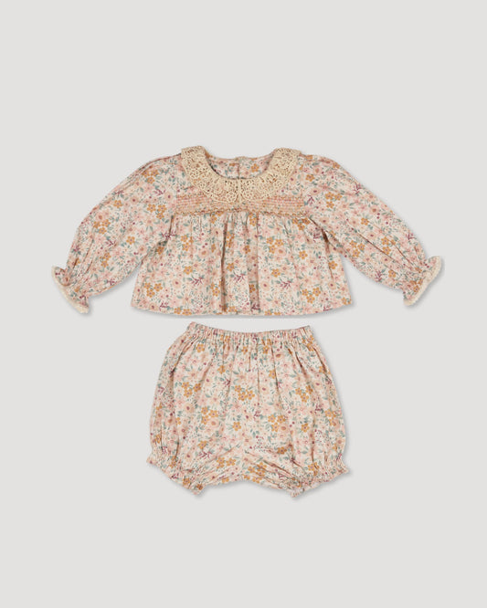 Early Sunday, Essie & Pippy Baby Set in Floral print, made from Printed 60s Cotton Satin fabric, featuring smocked sleeves with laced neckline & matching bloomers, shown in a front flat-lay view