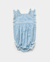 Early Sunday, Eva Baby Romper in Tonal Floral Blue color, made from 100% Cotton Swiss Dobby Tiny Dots fabric, featuring a sleeveless design with lace border, shown in a front flat-lay view