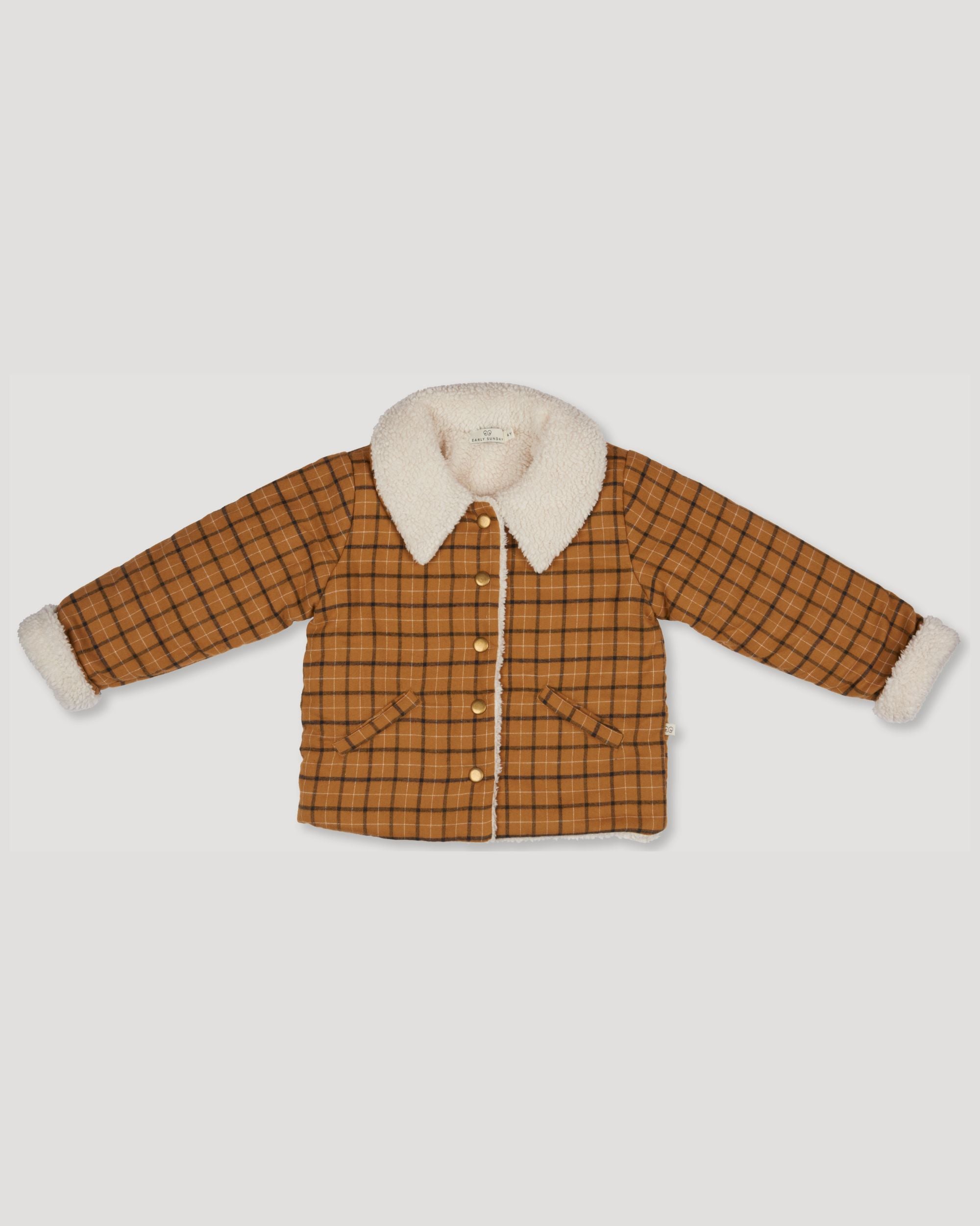 Early Sunday, Franka Jacket in Almond Checks, made from Cotton Yarn Dyed Brushed Checks fabric, featuring Cozy, softly structured jacket with a plush sherpa lining and gentle detailing for warmth without bulk, shown in a front flat-lay view