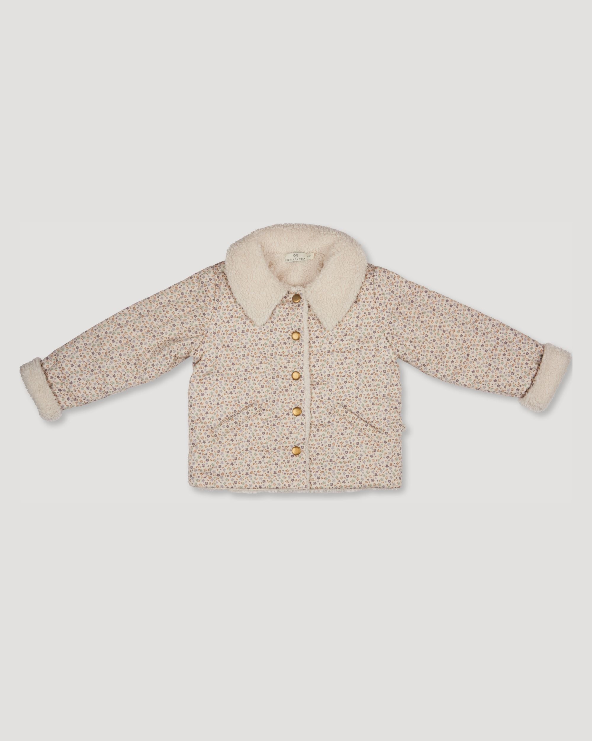 Early Sunday, Franka Jacket in Miny Flowers print, made from Printed 30s Cotton Twill fabric, featuring Cozy, softly structured jacket with a plush sherpa lining and gentle detailing for warmth without bulk, shown in a front flat-lay view