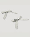 Early Sunday, Chiara Alligator Clip in Mini Flower print, made from Printed canvas 70% Cotton 30% Linen fabric, featuring a bow design on an alligator clip with a secure fit, shown in a back flat-lay view