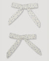 Early Sunday, Chiara Alligator Clip in Mini Flower print, made from Printed canvas 70% Cotton 30% Linen fabric, featuring a bow design on an alligator clip with a secure fit, shown in a front flat-lay view