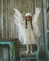 Early Sunday, Grace Cape in Hazelnut Cream, made from Dyed Nylon Mesh Dobby fabric, featuring Tiered ruffles create volume and whimsical movement, shown in a model in motion