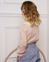 Early Sunday, Grace Clip in Feather print, made from Printed 60s Cotton Cambric fabric, featuring a set of two bow clips with a secure fit, shown in a back view of model wearing it