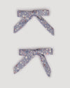 Early Sunday, Grace Clip in Celestial print, made from Printed 60s Cotton Satin fabric, featuring a set of two bow clips with a secure fit, shown in a front flat-lay view