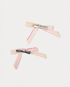 Early Sunday, Grace Clip in Pink Stripes print, made from Printed 70% Cotton, 30% Linen fabric, featuring a set of two bow clips with a secure fit, shown in a back flat-lay view