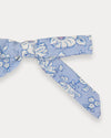 Early Sunday, Grace Clip in Tonal Floral Blue color, made from Printed Cotton Tiny Swiss Dobby fabric, featuring a set of two bow clips with a secure fit, shown in closeup flat-lay view