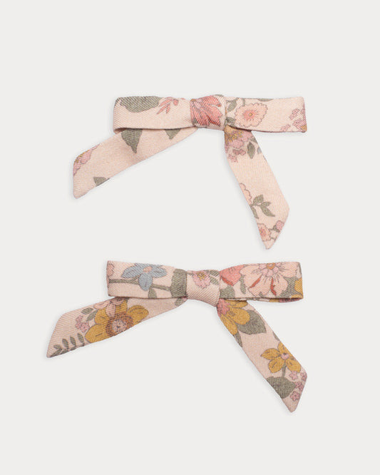 Early Sunday, Grace Clip in Bloom Blush, made from Printed Viscose Twill fabric, featuring a set of two bow clips with a secure fit, shown in a front flat-lay view