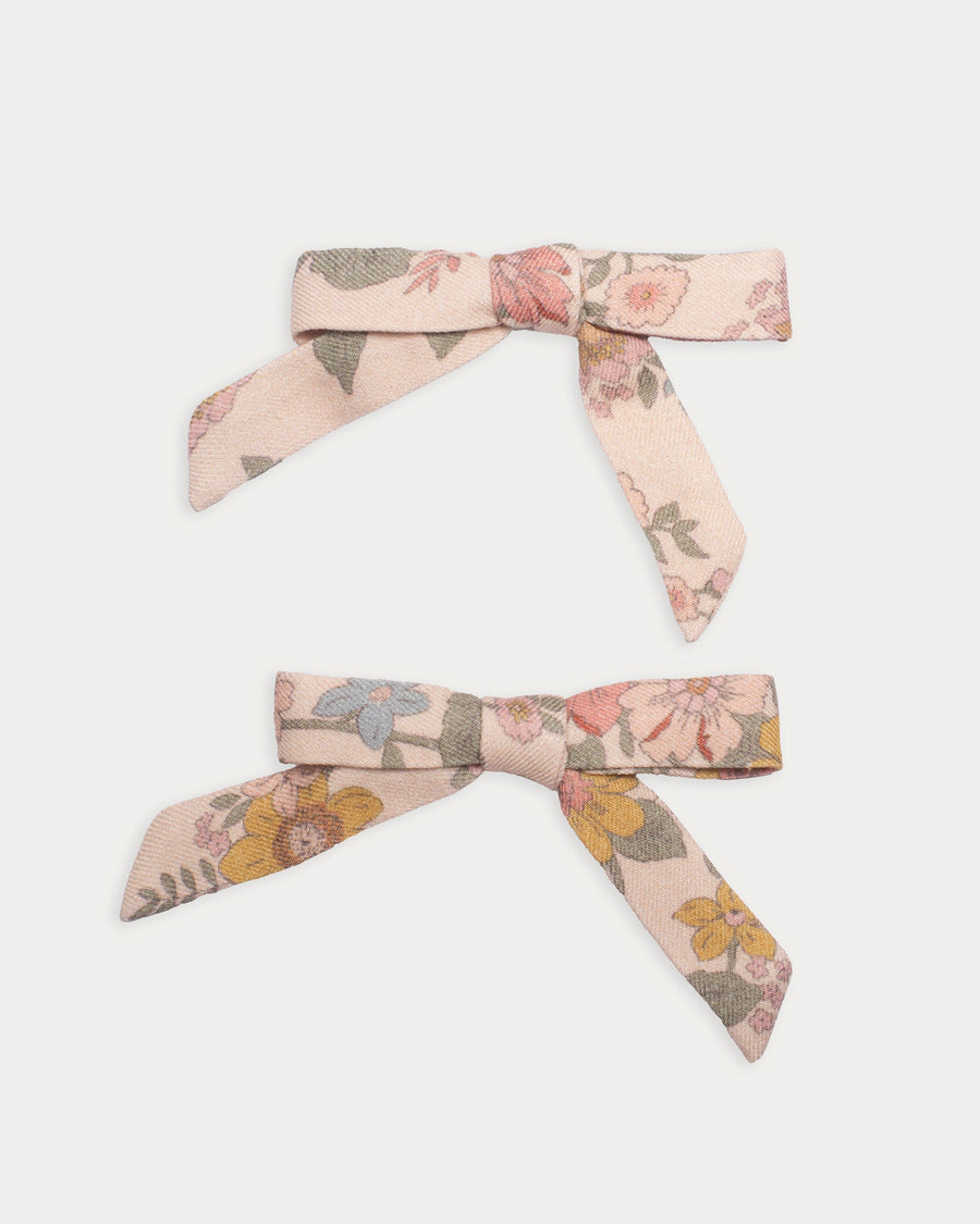 Early Sunday, Grace Clip in Bloom Blush, made from Printed Viscose Twill fabric, featuring a set of two bow clips with a secure fit, shown in a front flat-lay view