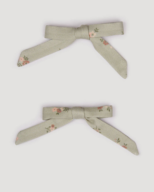 Early Sunday, Grace Clip in Ditsy Bouquet Jade print, made from Printed Viscose Twill fabric, featuring a set of two bow clips with a secure fit, shown in a front flat-lay view