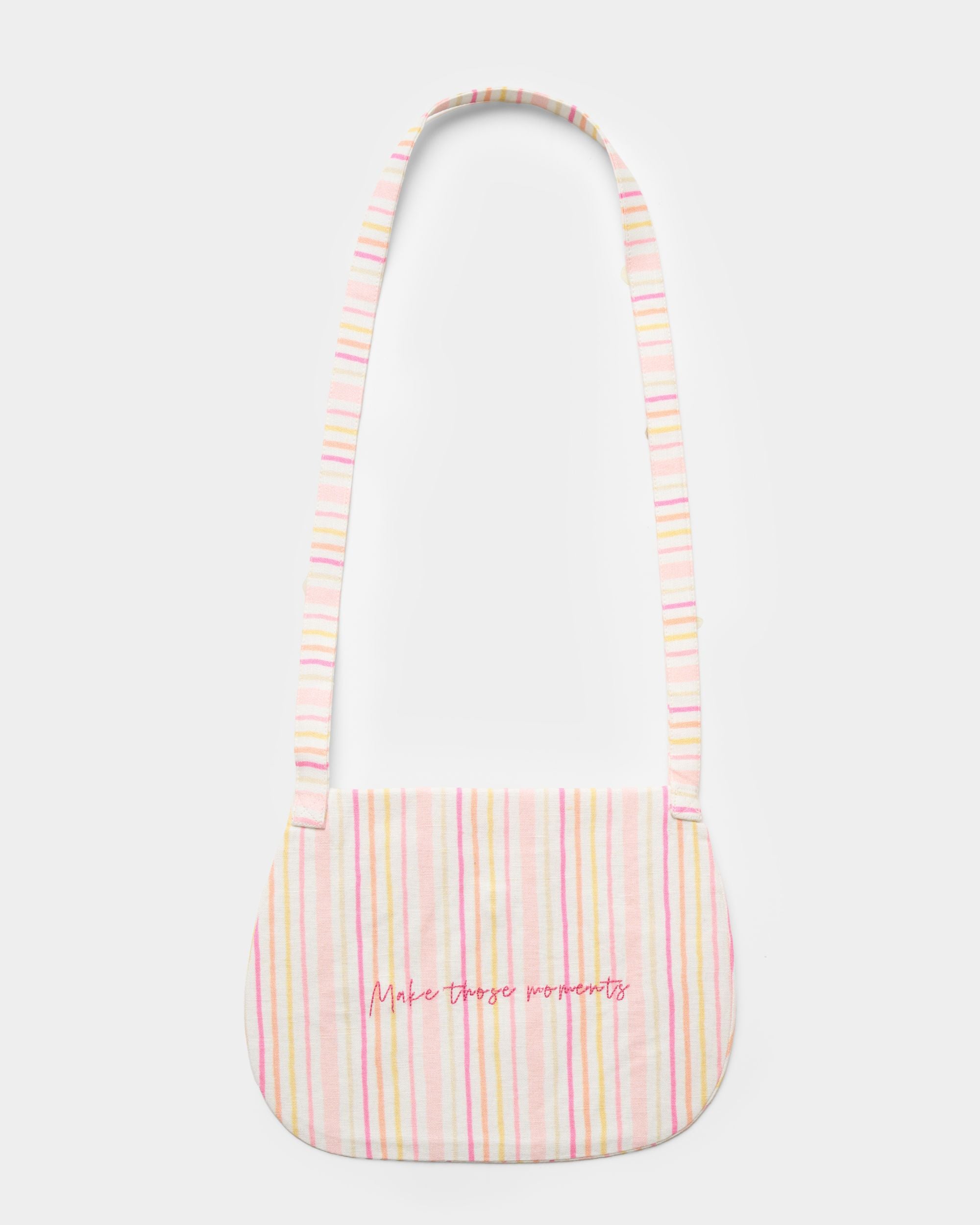 Early Sunday, Hudson Purse in Pink Stripes print, made from 70% Cotton, 30% Linen fabric, featuring a gathered sling purse design with a flap closure, shown in a back flat-lay view