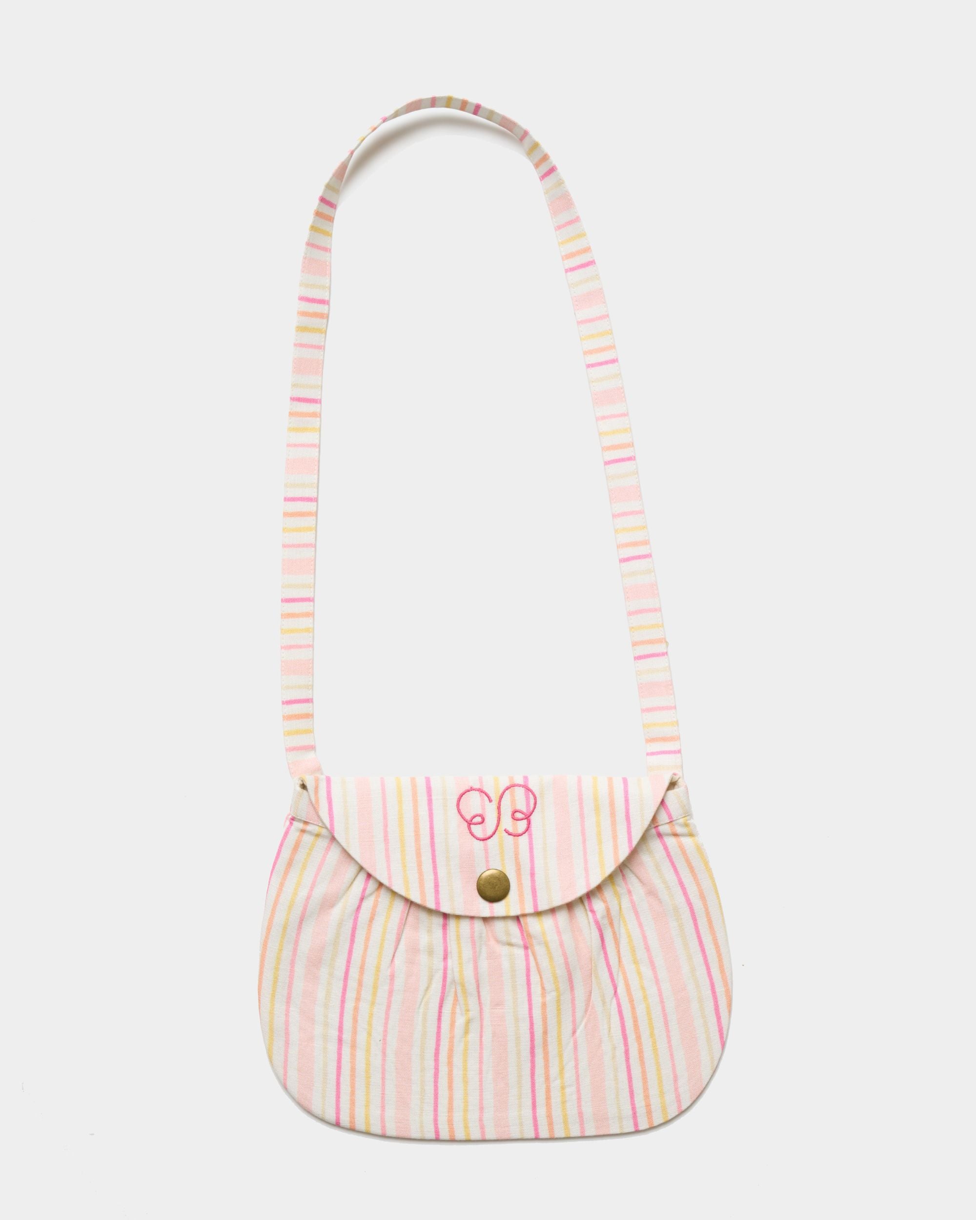 Early Sunday, Hudson Purse in Pink Stripes print, made from 70% Cotton, 30% Linen fabric, featuring a gathered sling purse design with a flap closure, shown in a front flat-lay view