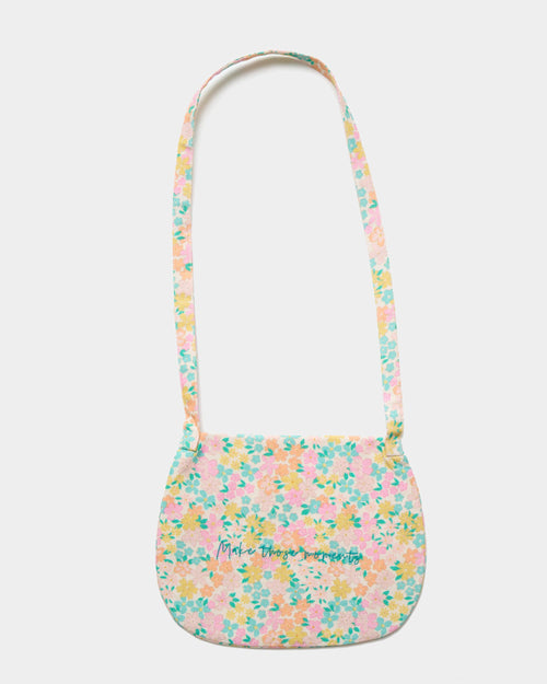 Early Sunday, Hudson Purse in Emma Floral Mint color, made from Organic Printed Cotton Cambric fabric, featuring a gathered sling purse design with a flap closure, shown in back flat-lay view