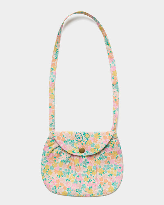 Early Sunday, Hudson Purse in Emma Floral Mint color, made from Organic Printed Cotton Cambric fabric, featuring a gathered sling purse design with a flap closure, shown in front flat-lay view