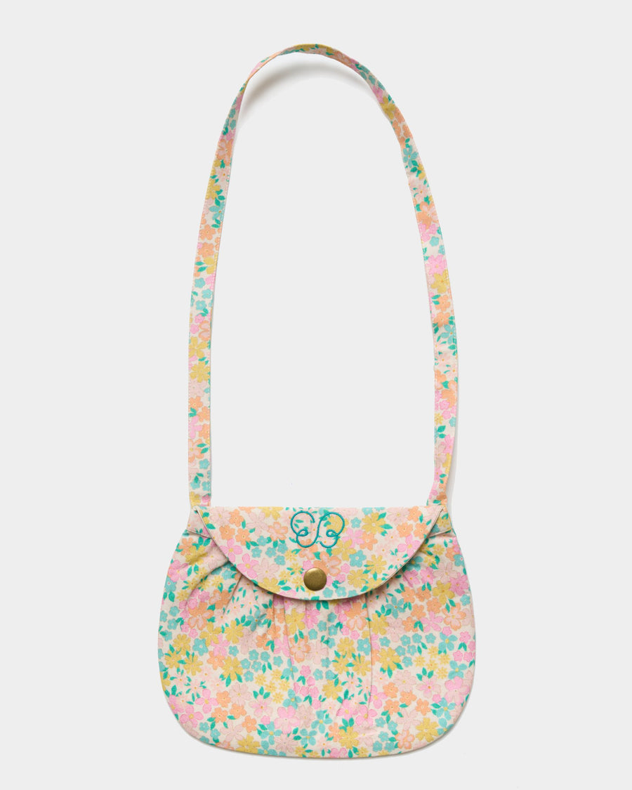 Early Sunday, Hudson Purse in Emma Floral Mint color, made from Organic Printed Cotton Cambric fabric, featuring a gathered sling purse design with a flap closure, shown in front flat-lay view