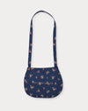 Early Sunday, Hudson Purse in Ditsy Bouquet Navy Blue, made from Printed Cotton Satin fabric, featuring a gathered sling purse design with a flap closure, shown in a back flat-lay view