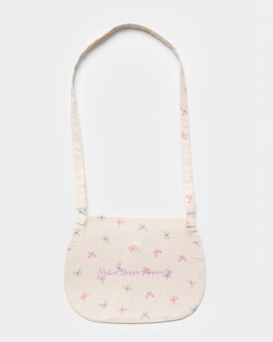 Early Sunday, Hudson Purse in Butterflies print, made from Printed Cotton Tiny Swiss Dobby fabric, featuring a gathered sling purse design with a flap closure, shown in a back flat-lay view