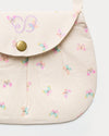 Early Sunday, Hudson Purse in Butterflies print, made from Printed Cotton Tiny Swiss Dobby fabric, featuring a gathered sling purse design with a flap closure, shown in a closeup flat-lay view