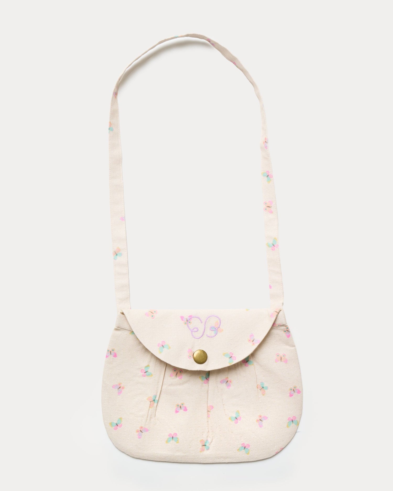 Early Sunday, Hudson Purse in Butterflies print, made from Printed Cotton Tiny Swiss Dobby fabric, featuring a gathered sling purse design with a flap closure, shown in a front flat-lay view