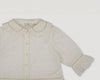 Early Sunday, Iris Blouse in Ivory color, made from All-Over Eyelet Embroidered Cotton Schifflie fabric, featuring relaxed fit with delicate detailing for a timeless and feminine look, shown in a closeup flat-lay view