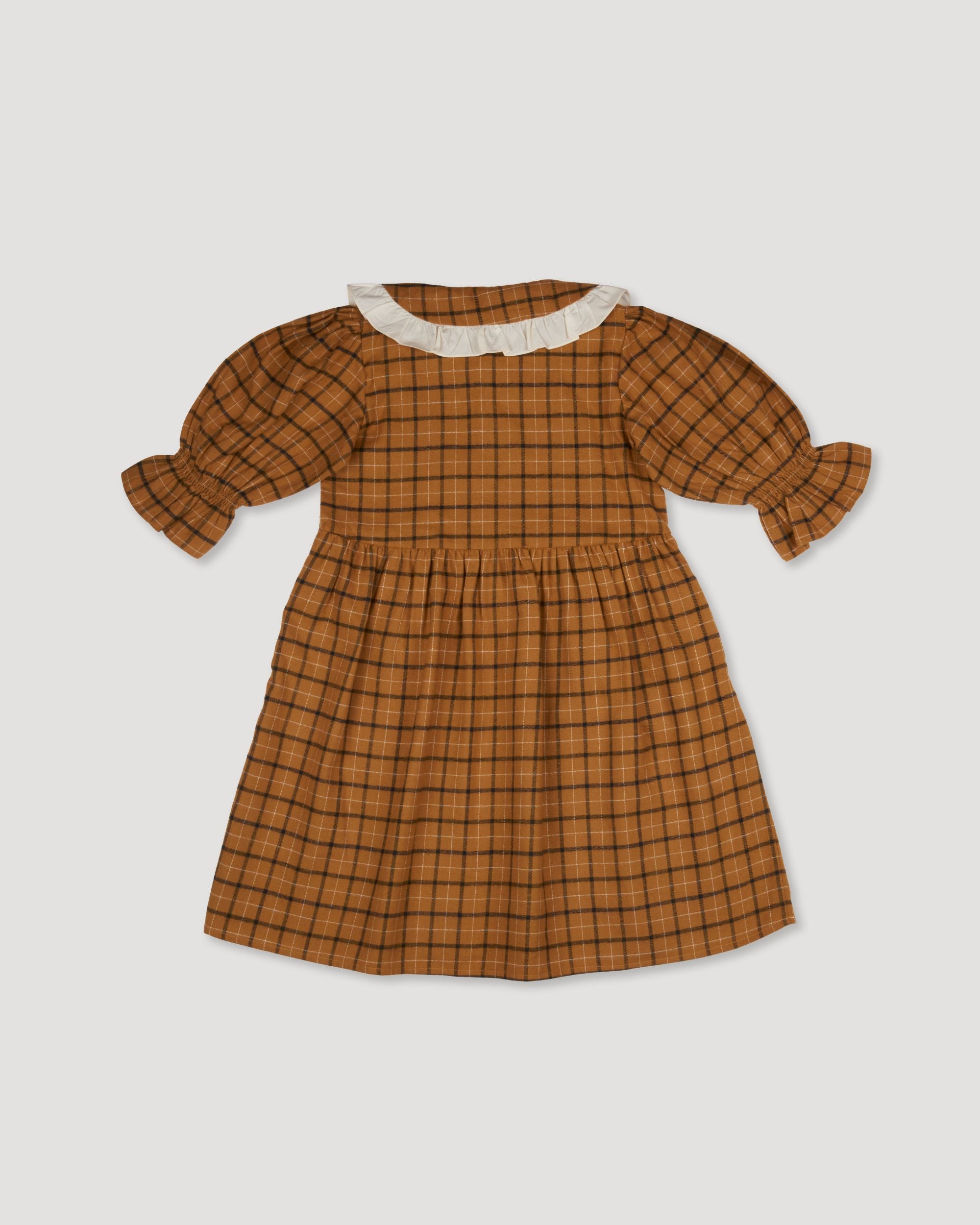 Early Sunday, Jacky Dress in Almond Checks, made from Cotton Yarn Dyed Brushed Checks fabric, featuring White contrast scallop-edge collar adds a sweet vintage touch, shown in a back flat-lay view