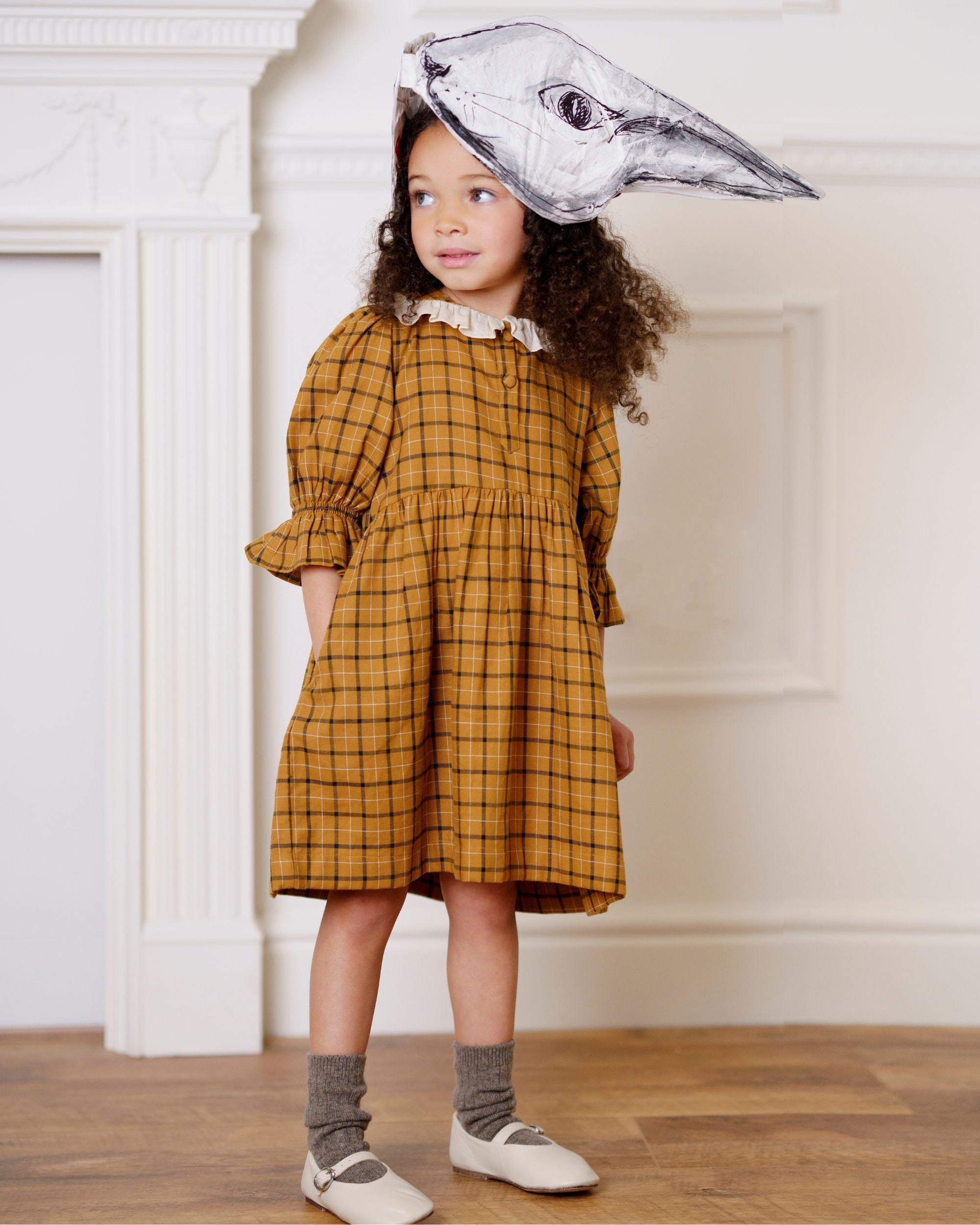 Early Sunday, Jacky Dress in Almond Checks, made from Cotton Yarn Dyed Brushed Checks fabric, featuring White contrast scallop-edge collar adds a sweet vintage touch, shown in a front view of model wearing it