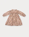 Early Sunday, Jeanette Dress in Bloom, made from Printed Viscose Twill fabric, featuring smocked chest with frilled neckline and soft gathered puff sleeves, shown in a front flat-lay view