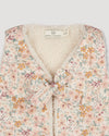 Early Sunday, Jilly Gilet in Floral print, made from Printed 60s Cotton Satin fabric, featuring a sleeveless gilet design with soft padding, shown in a closeup flat-lay view