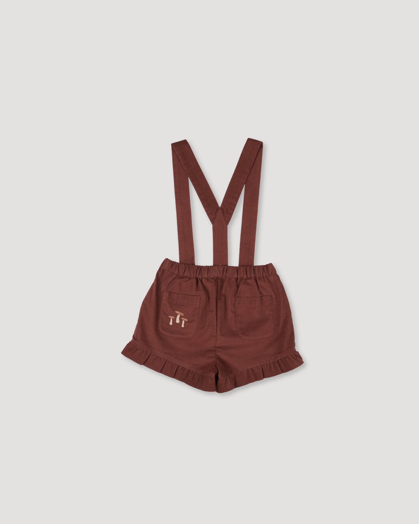 Early Sunday, Joseph Short Dungaree in Caramel, made from Cotton Corduroy fabric, featuring short dungaree with adjustable straps, shown in a back flat-lay view