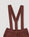 Early Sunday, Joseph Short Dungaree in Caramel, made from Cotton Corduroy fabric, featuring short dungaree with adjustable straps, shown in a closeup flat-lay view