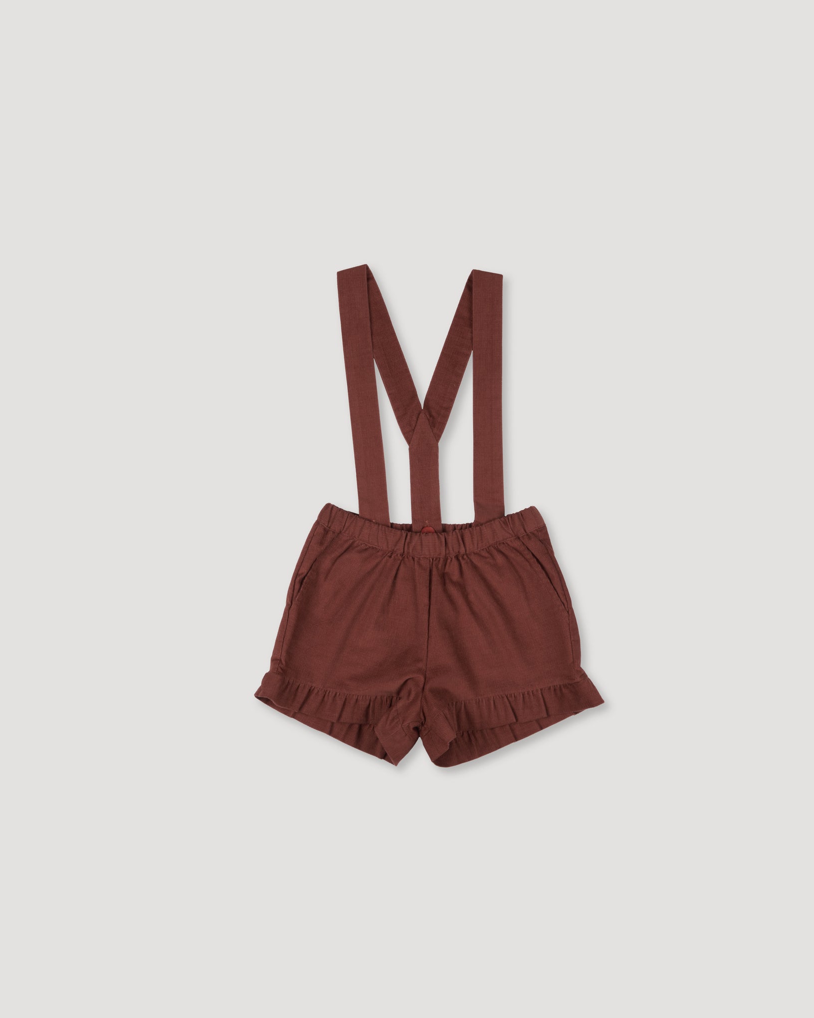 Early Sunday, Joseph Short Dungaree in Caramel, made from Cotton Corduroy fabric, featuring short dungaree with adjustable straps, shown in a front flat-lay view