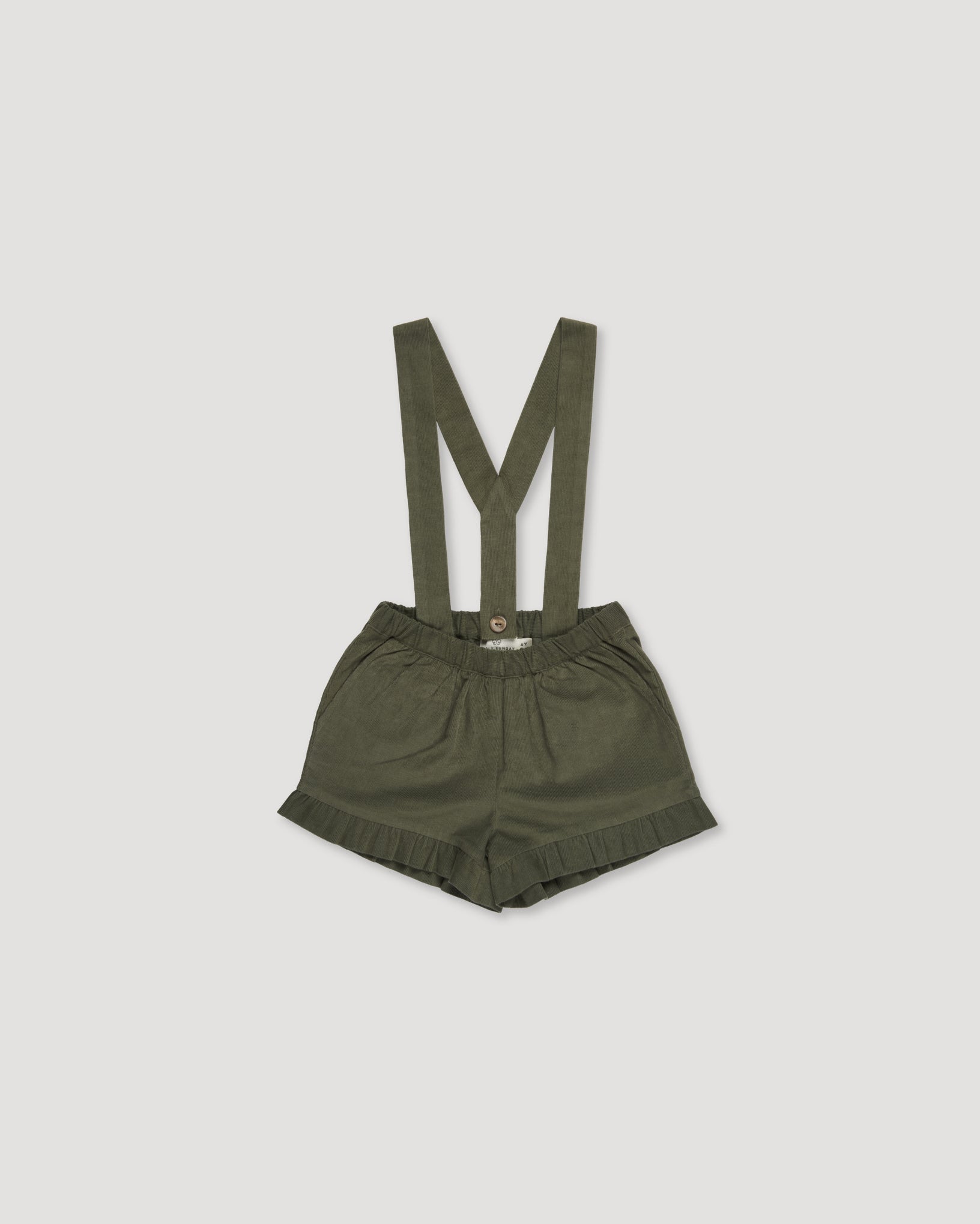 Early Sunday, Joseph Short Dungaree in Moss, made from Cotton Corduroy fabric, featuring short dungaree with adjustable straps, shown in a back flat-lay view