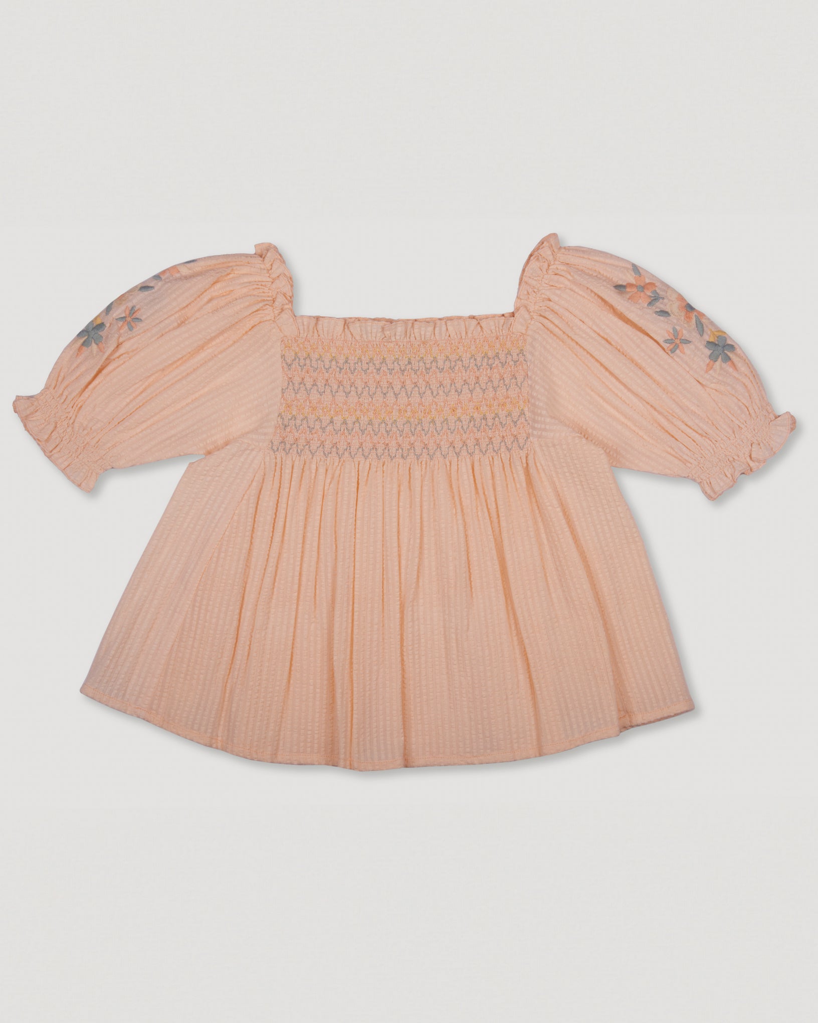 Early Sunday, Judith Blouse in Warm Sand color, made from Cotton Seersucker fabric, featuring relaxed fit with delicate finishes, combining style and functionality, shown in a front flat-lay view