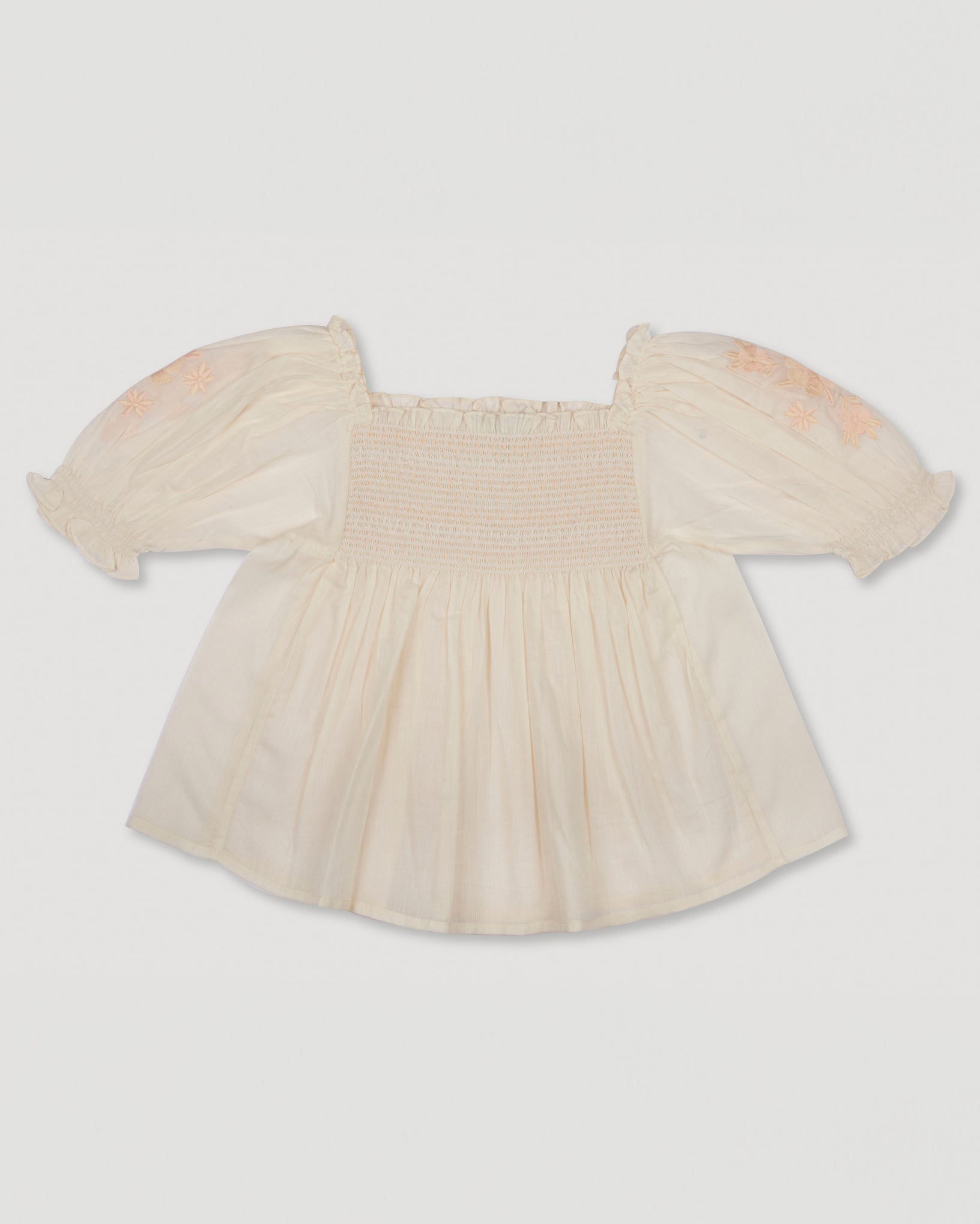 Early Sunday, Judith Blouse in Cream color, made from Cotton Voile fabric, featuring relaxed fit with delicate finishes, combining style and functionality, shown in a front flat-lay view