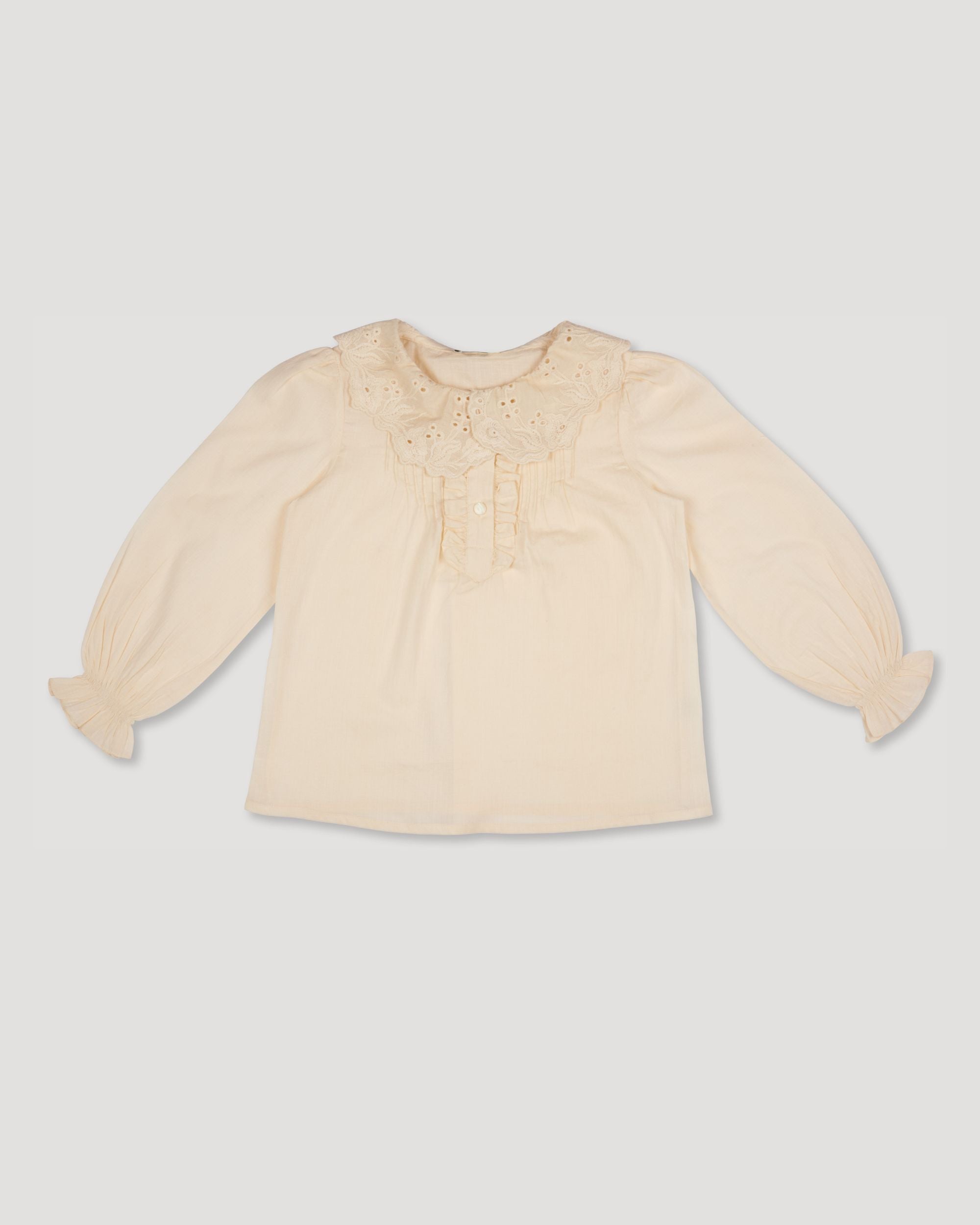 Early Sunday, Julianne Blouse in Hazelnut Cream, made from Dyed Cotton Swiss Dobby Tiny Dots fabric, featuring Comfort-first design with a playful silhouette, shown in a front flat-lay view
