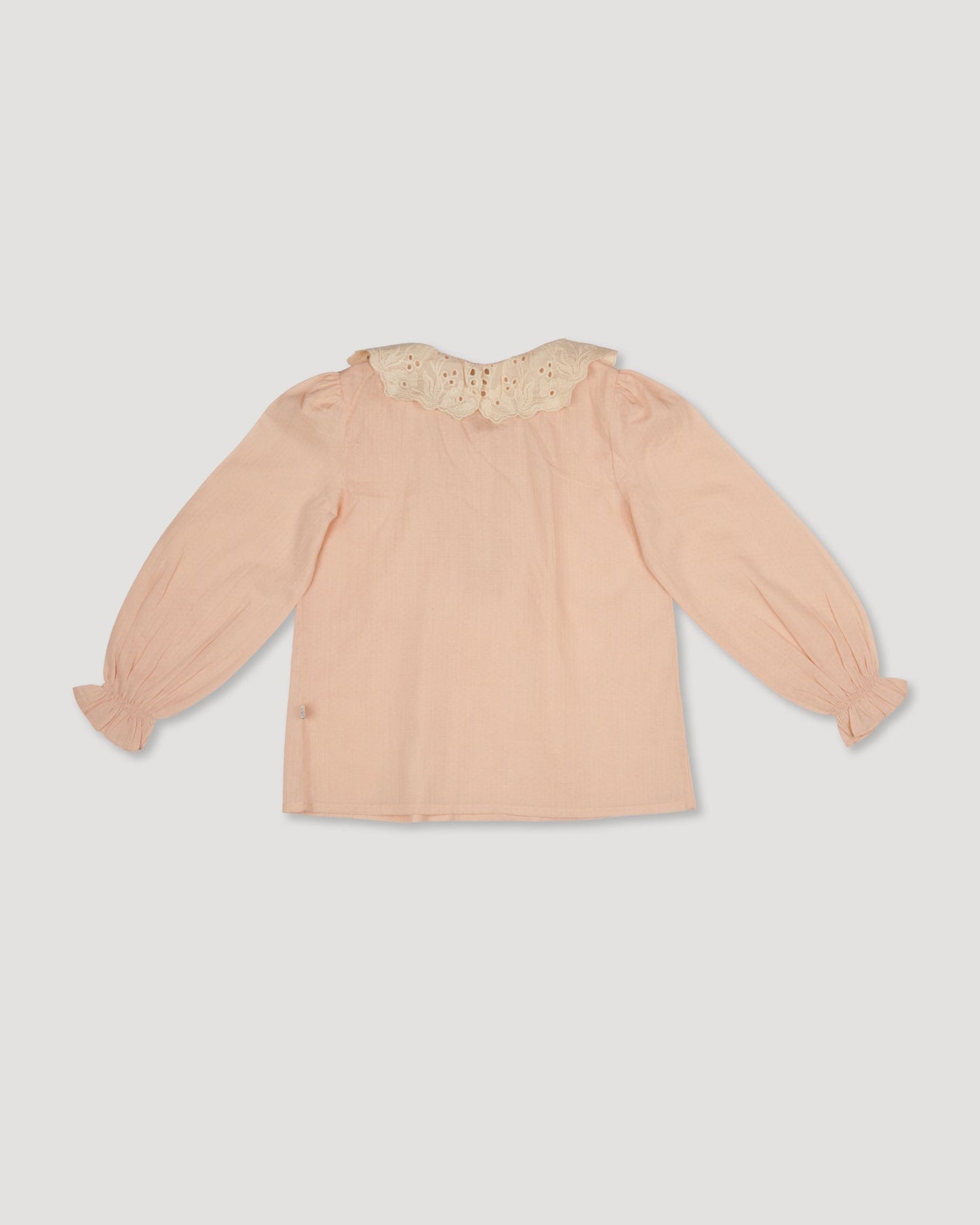 Early Sunday, Julianne Blouse in Nude, made from Dyed Cotton Swiss Dobby Tiny Dots fabric, featuring Comfort-first design with a playful silhouette, shown in a back flat-lay view