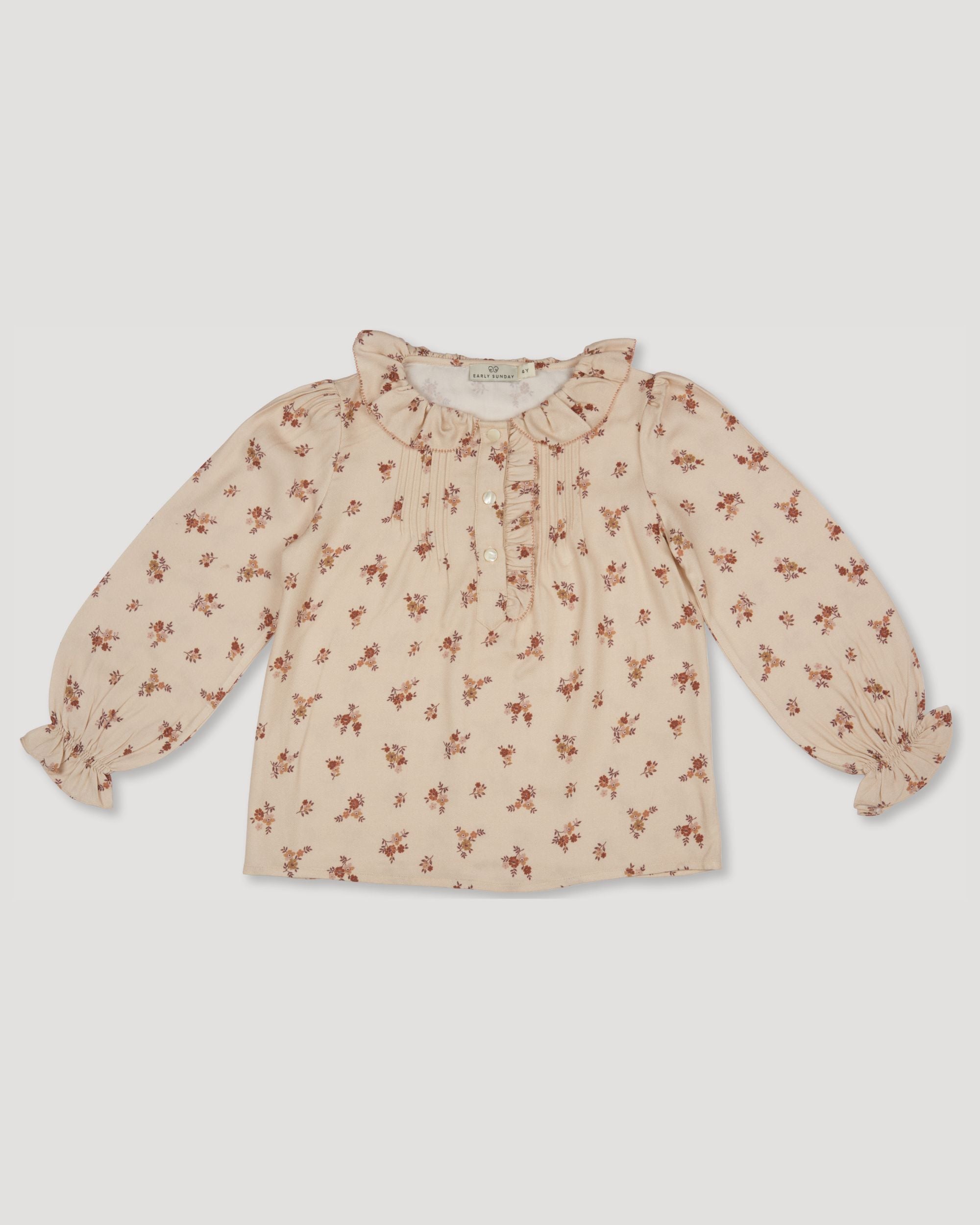 Early Sunday, Julianne Blouse in Ditsy Bouquet Cream print, made from Printed Viscose Rayon Twill fabric, featuring Comfort-first design with a playful silhouette, shown in a front flat-lay view