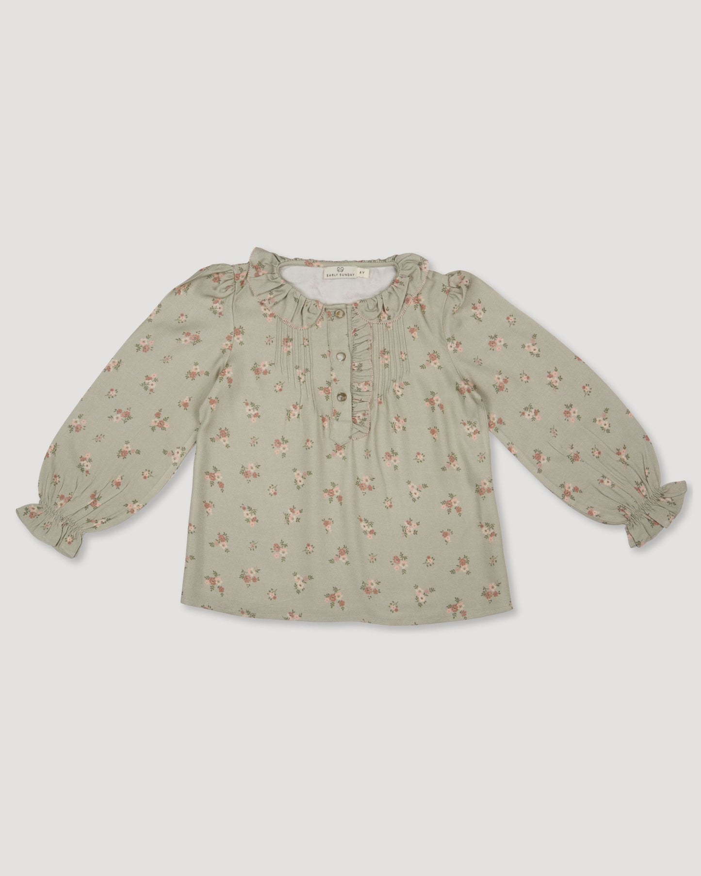 Early Sunday, Julianne Blouse in Ditsy Bouquet Jade print, made from Printed Viscose Rayon Twill fabric, featuring Comfort-first design with a playful silhouette, shown in a front flat-lay view