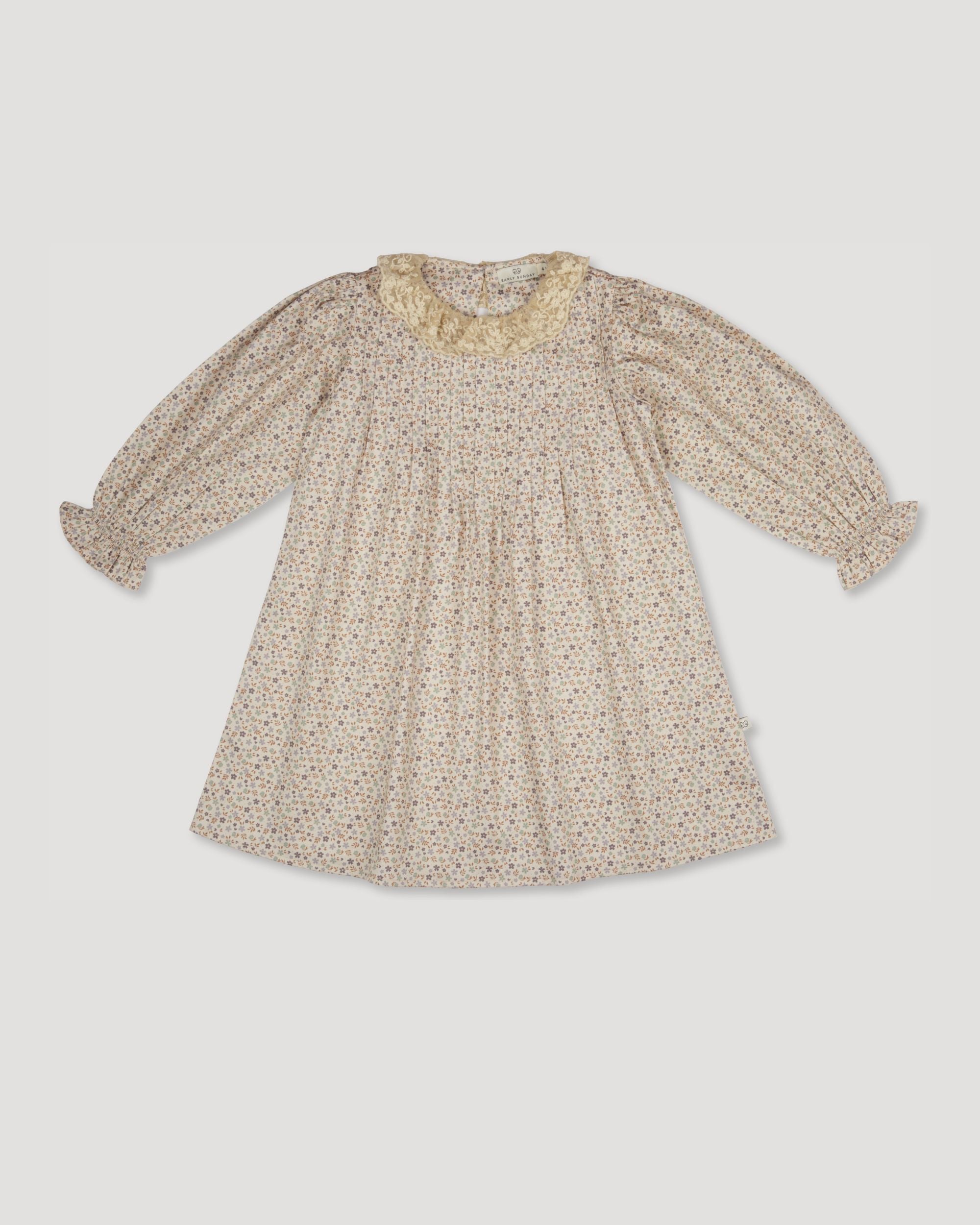 Early Sunday, Julie Dress in Miny Flowers print, made from Printed Cotton Satin fabric, featuring Delicate lace collar paired with a softly structured silhouette for a refined, timeless finish, shown in a front flat-lay view