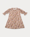 Early Sunday, Julie Dress in Bloom, made from Printed Viscose Twill fabric, featuring puffy gathered sleeves with frilled neckline, shown in a front flat-lay view