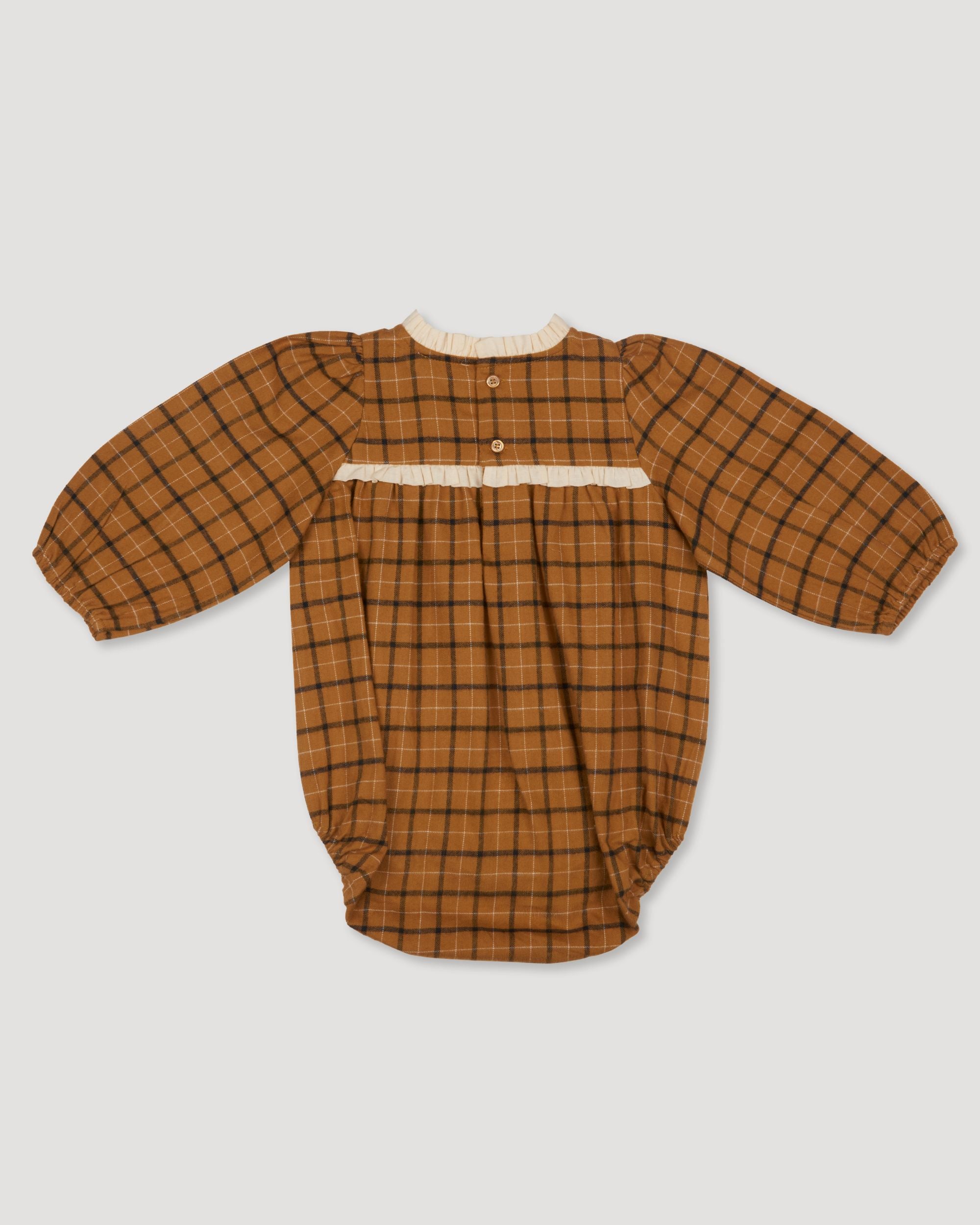 Early Sunday, Kayla Baby Romper in Almond Checks print, made from Cotton Yarn Dyed Brushed Checks fabric, featuring long gathered sleeves & frilled neckline, shown in a back flat-lay view