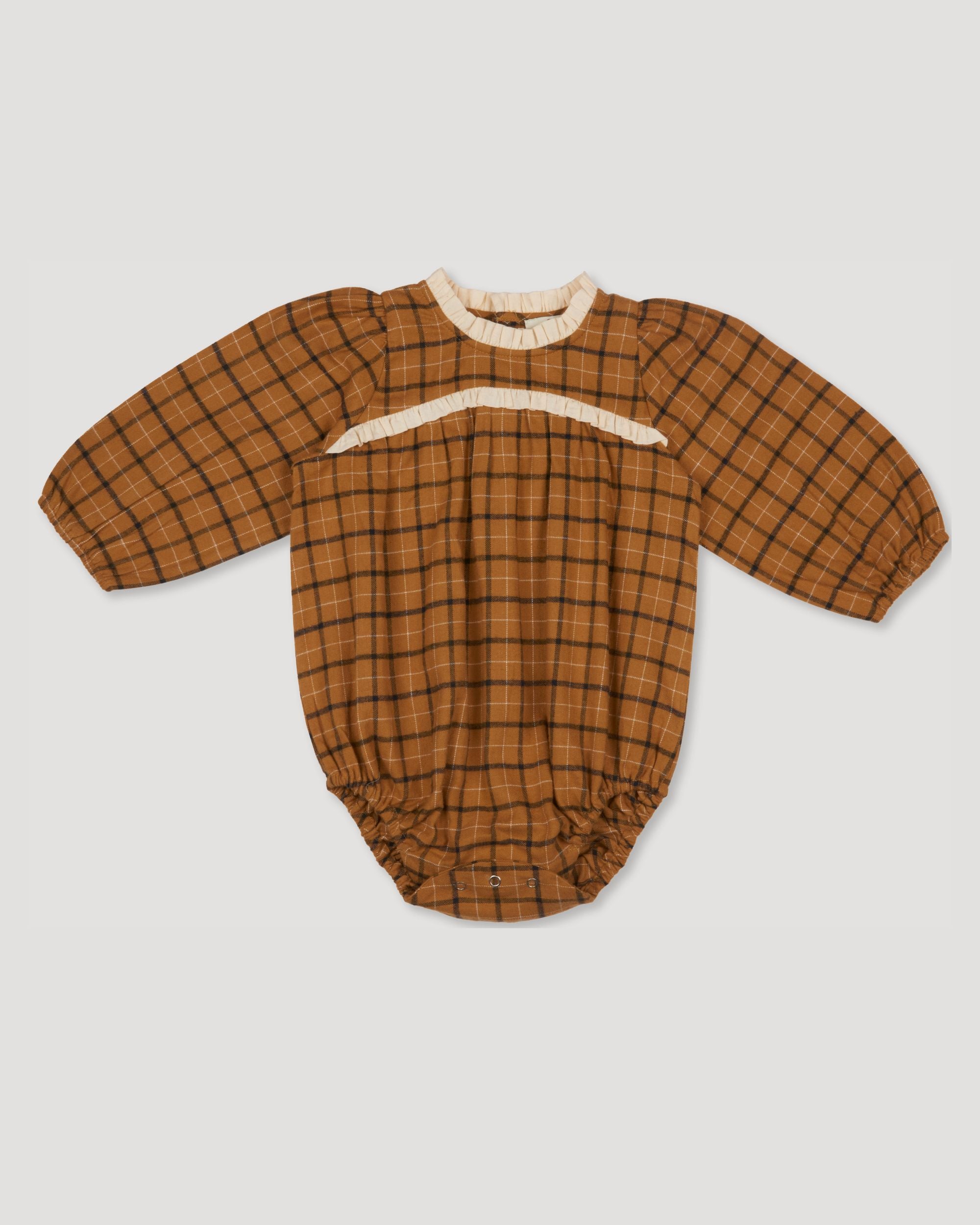 Early Sunday, Kayla Baby Romper in Almond Checks print, made from Cotton Yarn Dyed Brushed Checks fabric, featuring long gathered sleeves & frilled neckline, shown in a front flat-lay view