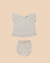 Early Sunday, Kitty Baby Blouse & Bloomer Set in Ivory color, made from 100% Cotton All Over Embroidery fabric, featuring a sleeveless flared sleeves with floral embroidery, shown in a front flat-lay view