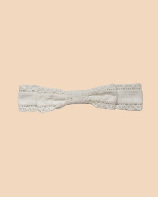 Early Sunday, Lace Headband in Ivory color, made from All-Over Embroidered fabric, featuring a soft lace headband with delicate swiss dot texture, shown in front flat-lay view