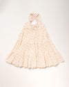 Early Sunday, Laura Dress in Butterfly Print color, made from printed cotton tiny swiss dobby fabric, featuring Crisscross ruffle straps with delicate trim accents and a softly gathered tiered skirt, shown in a front flat-lay view