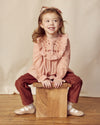 Early Sunday, Lauren Blouse in Dusty Pink, made from Cotton Double Gauze fabric, featuring relaxed fit with a floral embroidered yoke, shown in a front view of a model wearing it in a studio setting