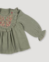 Early Sunday, Lauren Blouse in Halcyon Green, made from Cotton Double Gauze fabric, featuring relaxed fit with a floral embroidered yoke, shown in a closeup flat-lay view